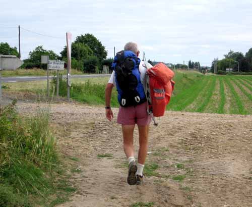 Another golden rule broken. Keith carrying Jenny's pack after we walked away from a functioning village on a Sunday Another golden rule broken. Keith carrying Jenny's pack after we walked away from a functioning village on a Sunday