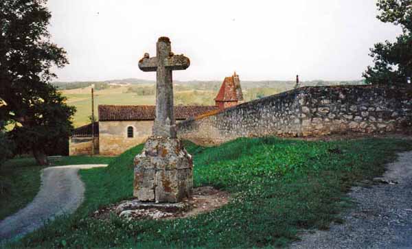 Walking in France: Pilgrim cross and church, Lamothe