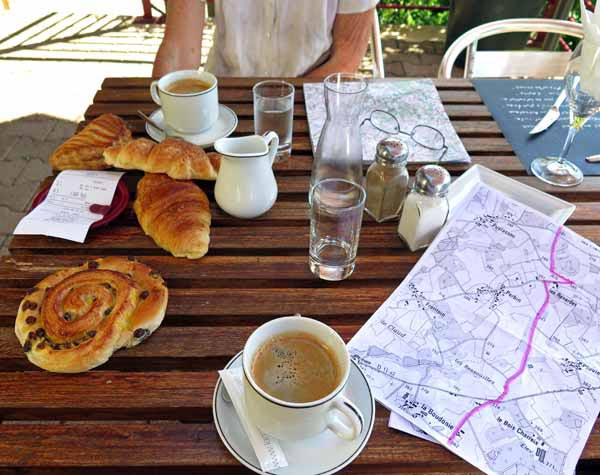 Walking in France: Consulting a home-made Géoportail TOP 25 map over second breakfast