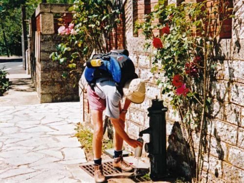 Walking in France: Filling up at a handy fountain