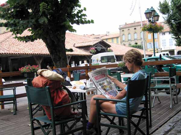 Walking in France: Catching up on the news of the Tour in the beautiful main square of Revel