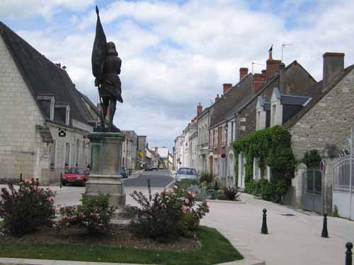 Walking in France: Joan of Arc looking down the main street of Sainte-Catherine-de-Fierbois