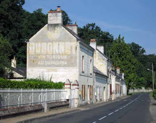 Walking in France: Ubiquitous faded Dubonnet sign