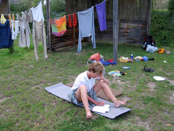 Walking in France: Writing the diary in the camping ground, Gaillac