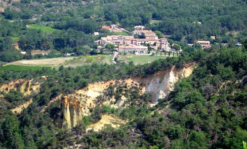 Walking in France: Looking down to Gintrac and its ochre cliffs