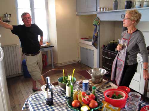 Walking in France: Philip and Lynne preparing our evening meal