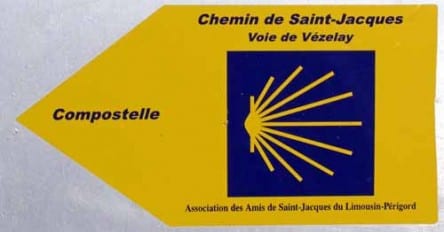 Walking in France: Blue and yellow pilgrimage track marker