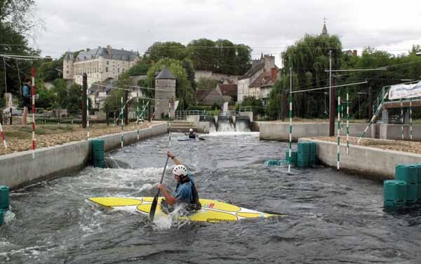 Walking in France: White-water slalom circuit with the château beyond, Châteauneuf-sur-Cher