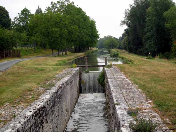Walking in France: Passing a narrow lock on the Canal de Berry