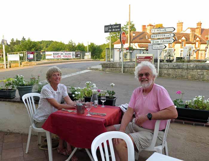 Walking in France: Two happy walkers waiting to be fed