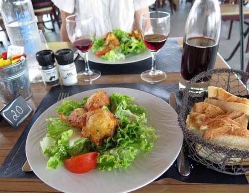 Walking in France: Lunch started with croquettes on a salad