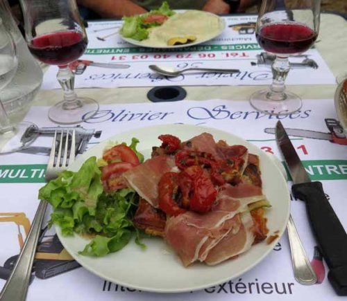 Walking in France: Entrées; vegetable pastry with ham and roasted tomatoes, and two enormous ravioli