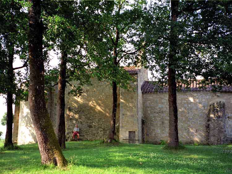 Walking in France: A pilgrim resting at the chapel of Sainte Germaine