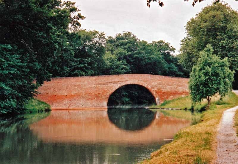 Walking in France: Ancient bridge over the Canal du Midi