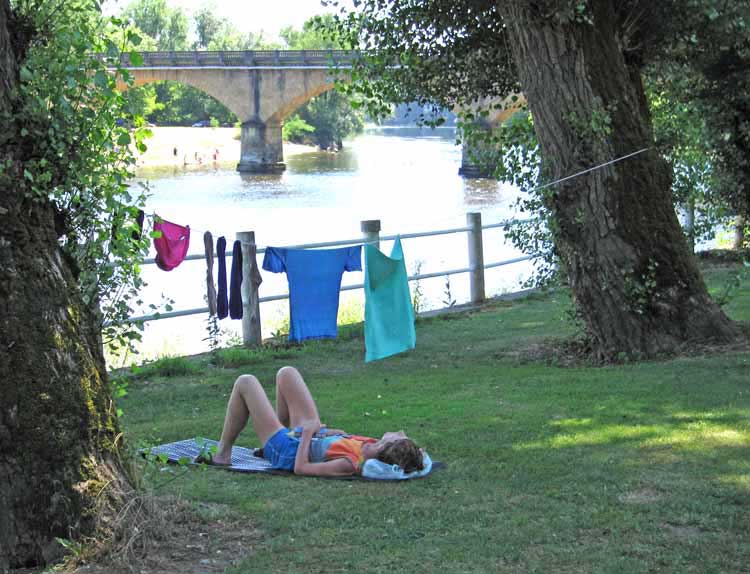 Walking in France: Having an afternoon nap beside the Dordogne after the washing has been done