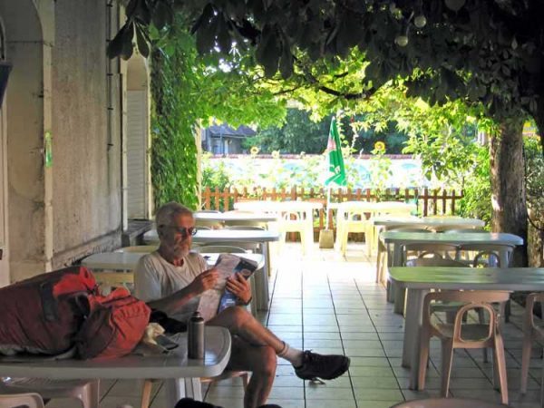 Walking in France: Having a rest and drink at a closed restaurant in Couzou