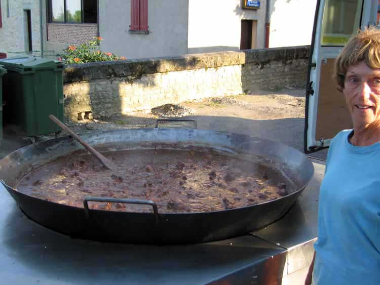 Walking in France: The communal coq au vin being prepared for the Bastille Day celebrations
