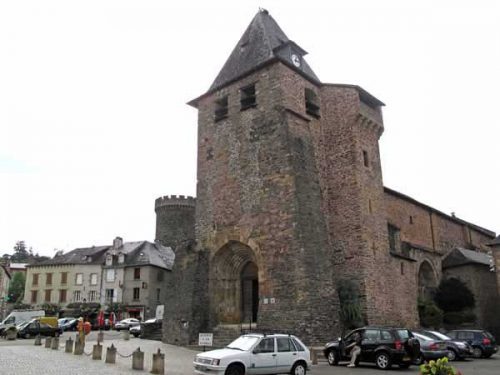 Walking in France: Church and the Tower of Caesar behind, Allassac