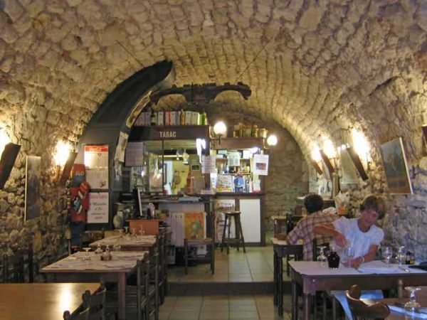 Walking in France: Pouring some wine before dinner arrives in the restaurant/cellar, Albas