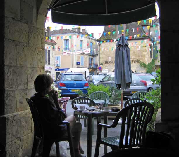 Walking in France: Enjoying the view from the arcade whilst having second breakfast