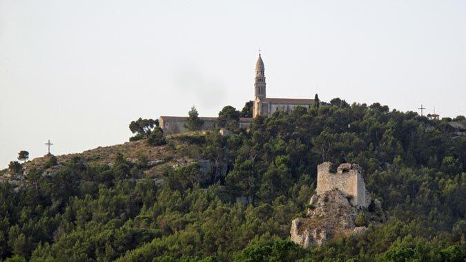 Walking in France: Church on the hill behind Orgon