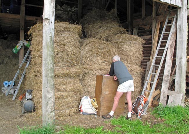Walking in France: Doing a crossword in the hayshed