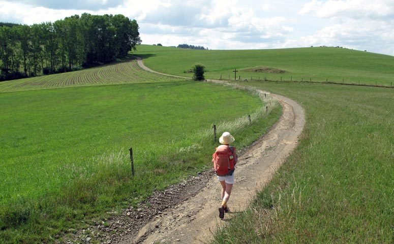 Walking in France: On the GR7, approaching the cross of Garin in the mountains of the Beaujolais