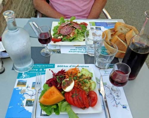 Walking in France: Entrées; a salade aveyronnaise and a plate of crudities