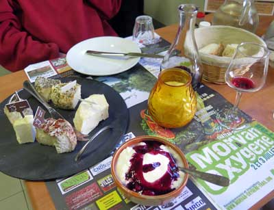 Walking in France: A cheese platter and a white fromage blanc with raspberry coulis