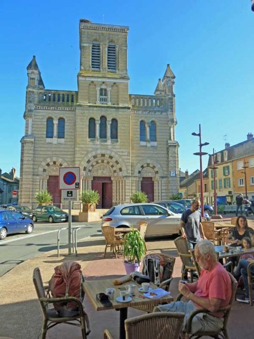 Walking in France: Morning coffee in the church square, Digoin