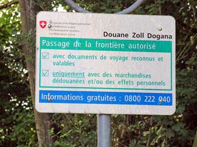 Walking in France: Swiss border sign