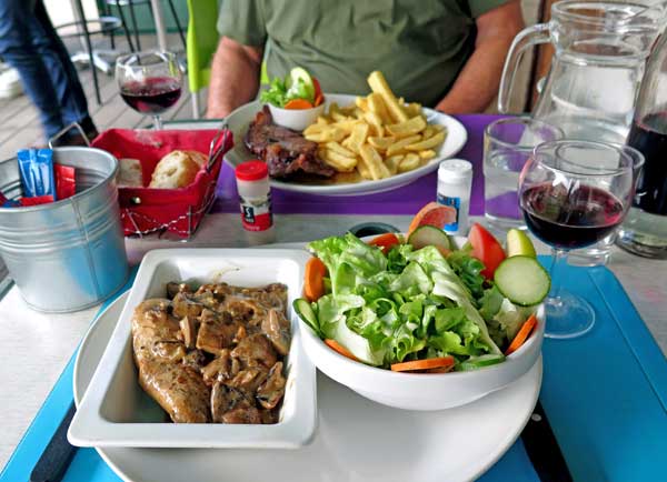 Walking in France: Our one course dinners - fondue de volaille stuffed with cèpes and accompanied by a salad, and a steak with chips