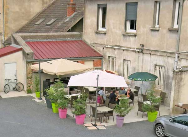 Walking in France: The view from our room of the hotel's courtyard dining area, l’Hotel du Centre, Gueugnon