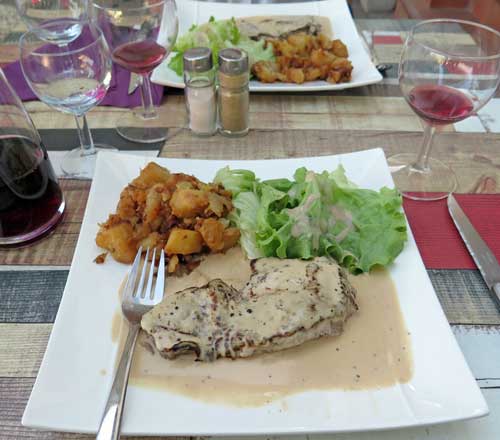 Walking in France: Followed by faux filet with green peppercorn sauce and sautéed potatoes