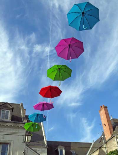 Walking in France: Coloured umbrellas at Bléré