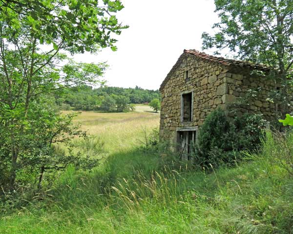 Walking in France: Climbing past an old barn