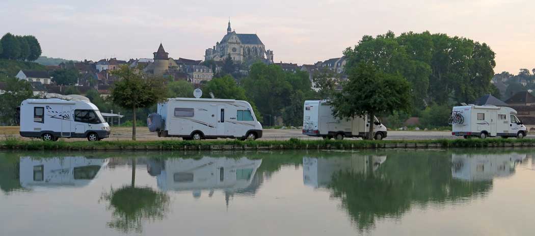 Walking in France: Looking across the Canal of Burgundy to the mighty church of St-Florentin