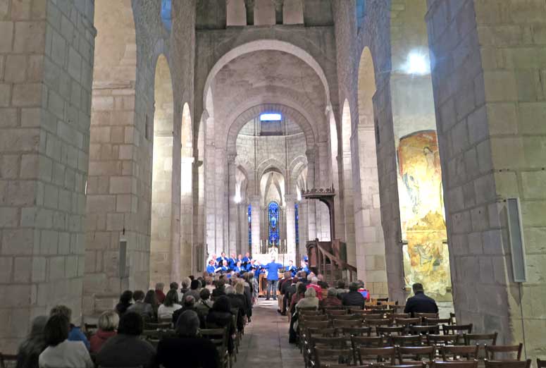 Walking in France: The male choir singing in the church of St-Léger, Ébreuil