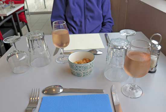 Walking in France: Apéritif of rosé and a bowl of nuts, Brasserie du Lac